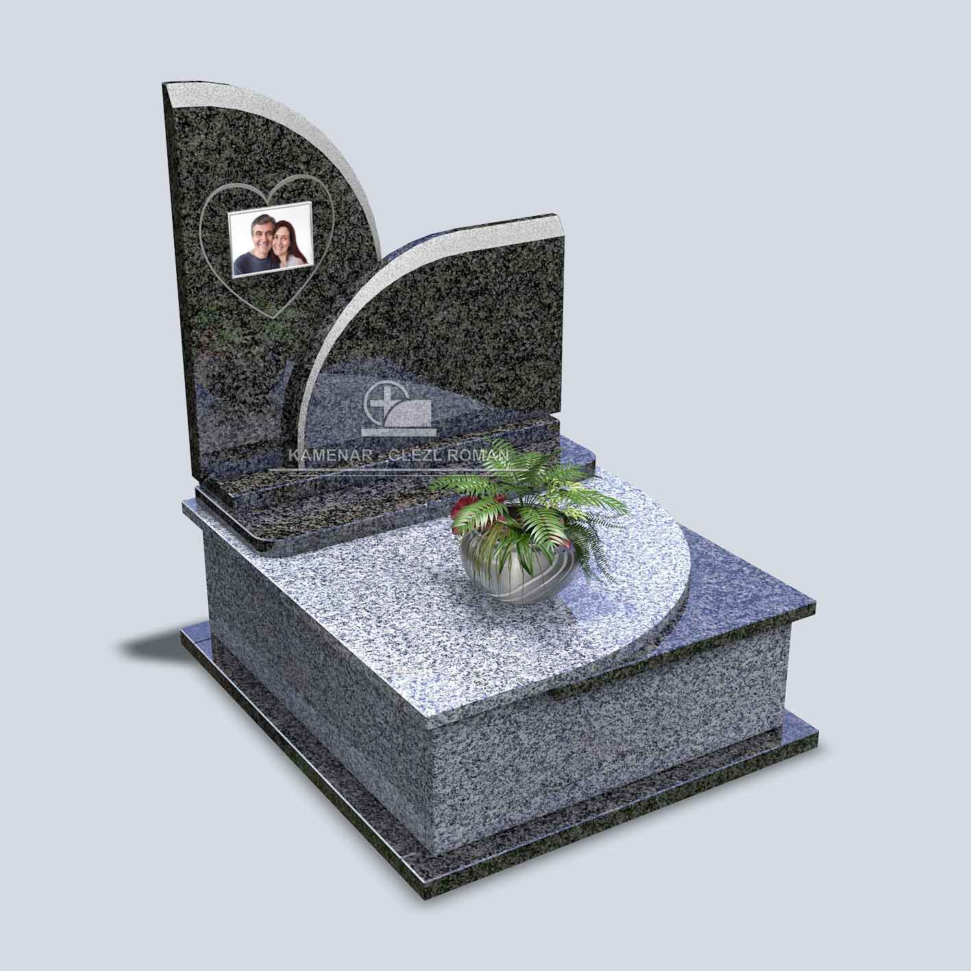 Oblúkový pomník na urny s fotkou na nápisnej tabuli a so striebornou misou s papraďou na krycej platni