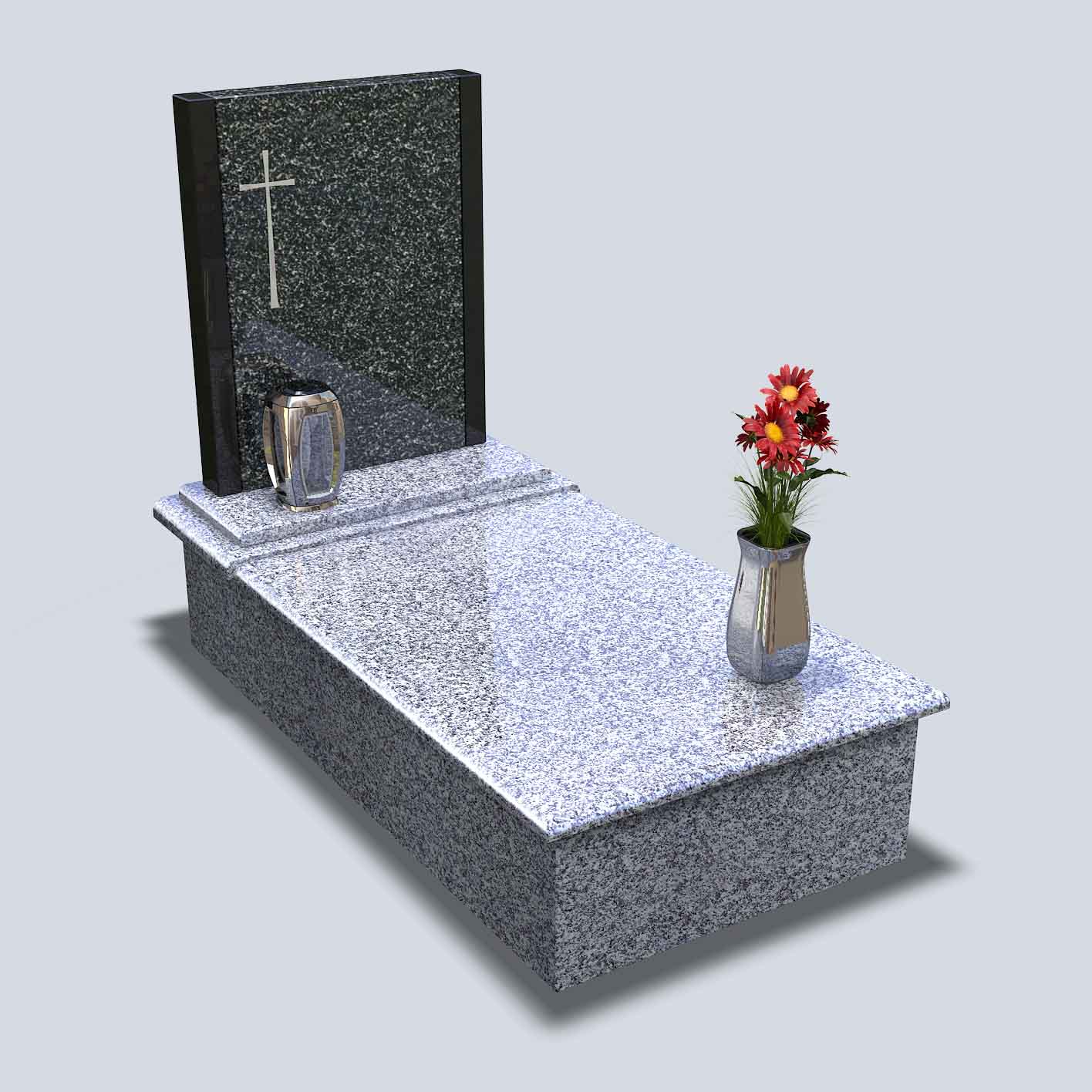 Urnový hrob s tmavou nápisnou tabuľou zo žuly a antikórovými doplnkami ako je svietnik a váza s kvetmi