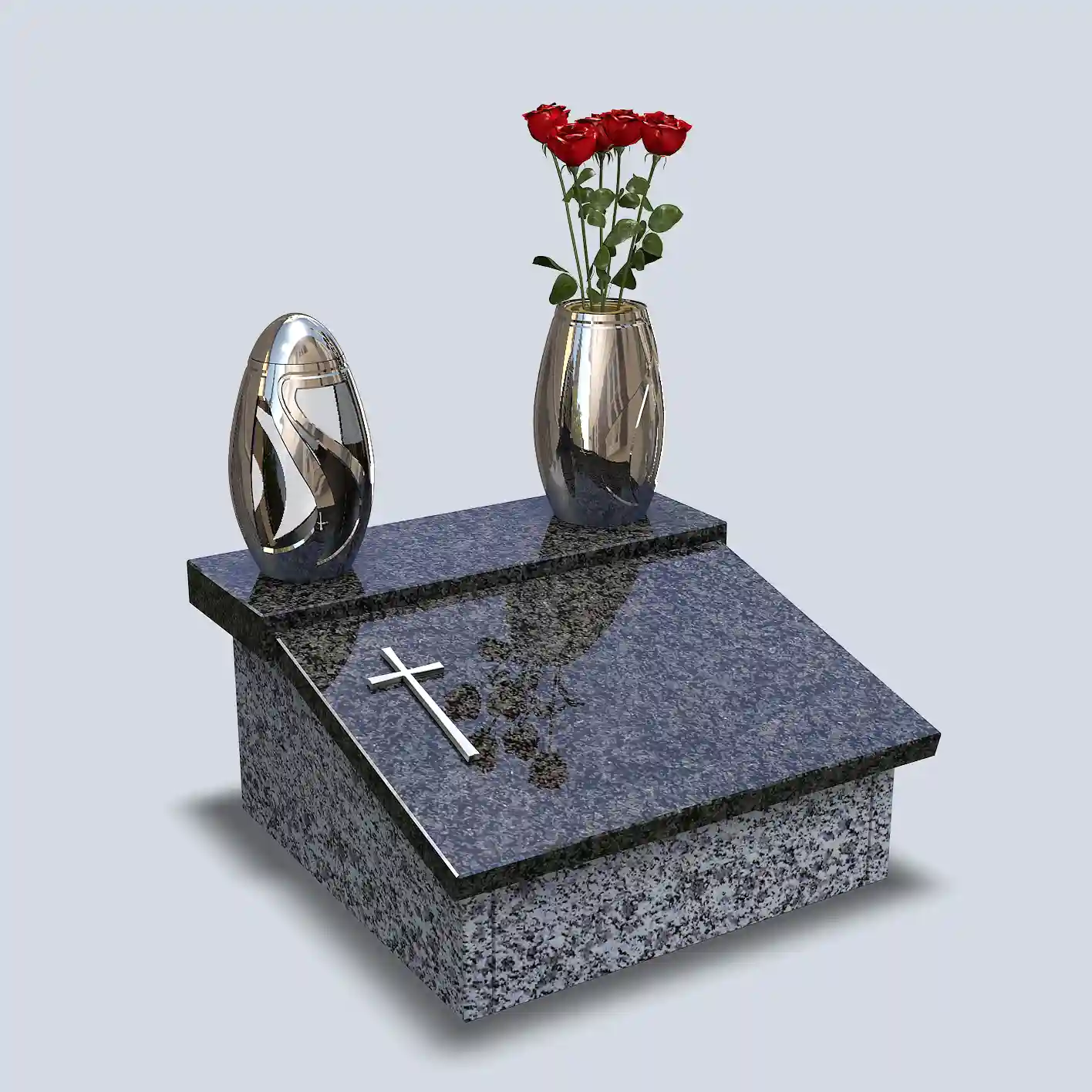 Urnový pomník z bledej a tmavej žuly so šikmým deklom, chrómové doplnky váza a svietnik