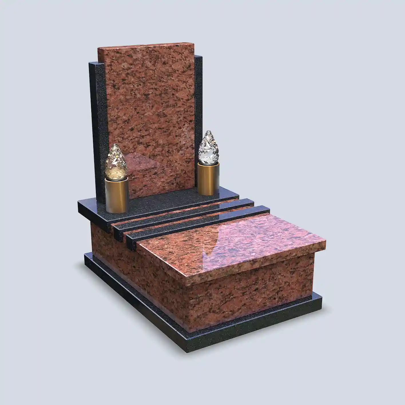 Žulový urnový pomník v červeno-tmavom vyhotovení a bronzovými svietnikmi